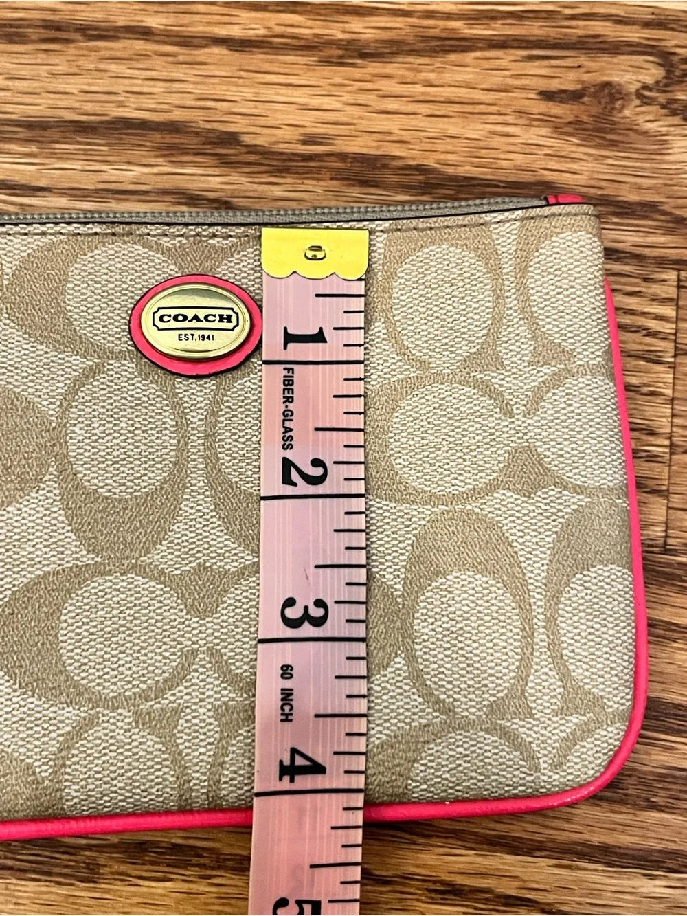 Coach Signature Canvas Wristlet with Coral Trim and Gold Hardware
